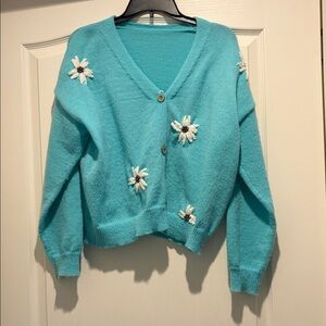 Chic Turquoise Cardigan with Floral Embellishments